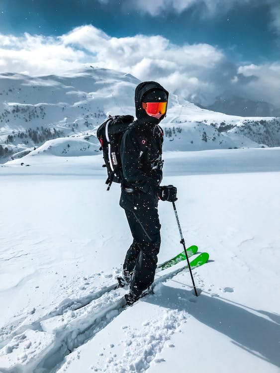 Snow activities and ski enthusiasts enjoying a winter day at Mt. Buller.